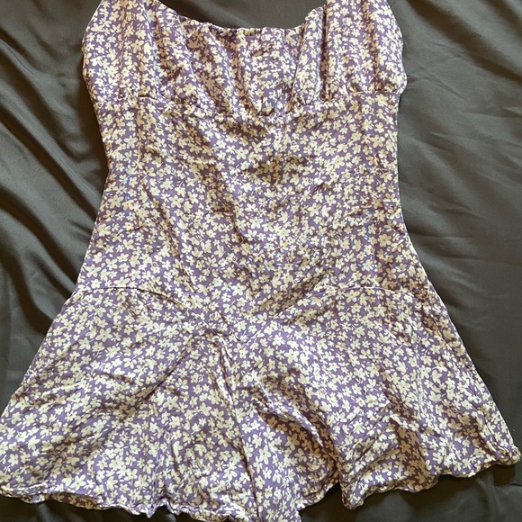 Lilac romper with white flowers, ruffle bottom - Picture 1 of 3